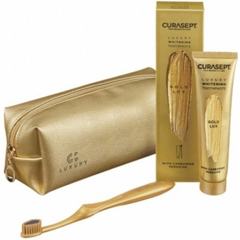 Curasept Gold zestaw wybielająca pasta 75 ml + szczoteczka + kosmetyczka