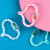 Curaprox Baby Zielony gryzak z grzechotką miękki na ząbkowanie 0-24 m